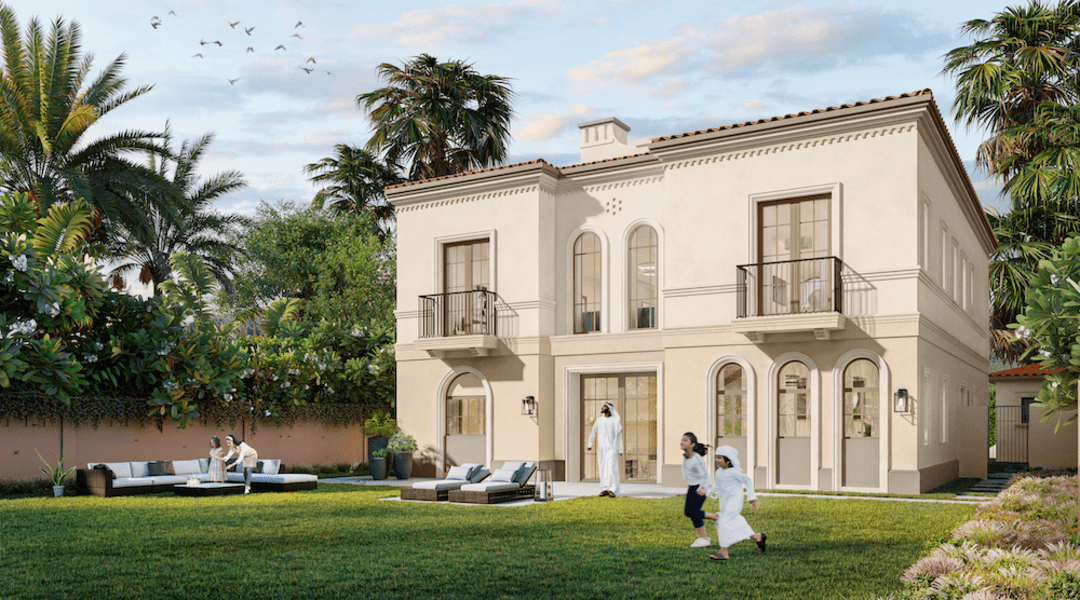 Wide-angle view of Bloom Living master-planned community with villas, townhouses, and central lagoon